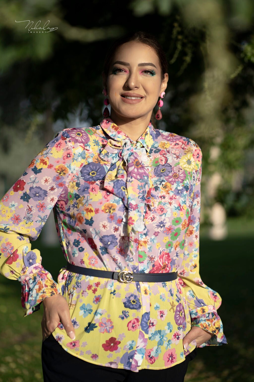 Fashion portrait of a woman in a floral dress, Qatar